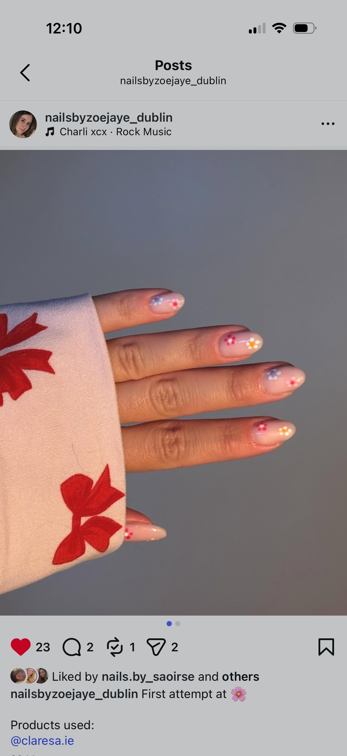 A graduate's first floral nail attempt